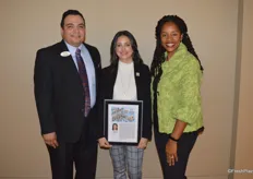 Manuel Michel, Angela Serna and Valda Coryat with the National Mango Board. Angela had just received a 40-Under-Forty Award from Produce Business.